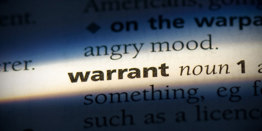 Warrant in writing